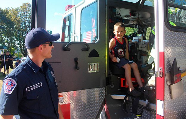 2013's National Night Out celebration came with a chance to check out fire trucks. This year's city event is Aug. 5 at Kennydale Lions Park.