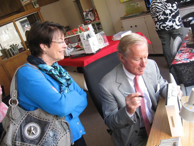 Sharon Kirry gets her sewing accessory kit signed by the 'rock star of the sewing industry