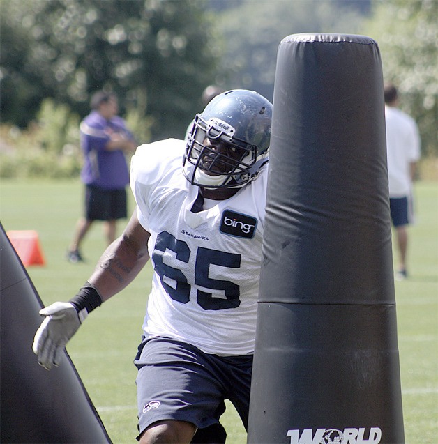 Rookie defensive tackle Ladi Ajiboye runs through a drill Aug. 2 at practice.