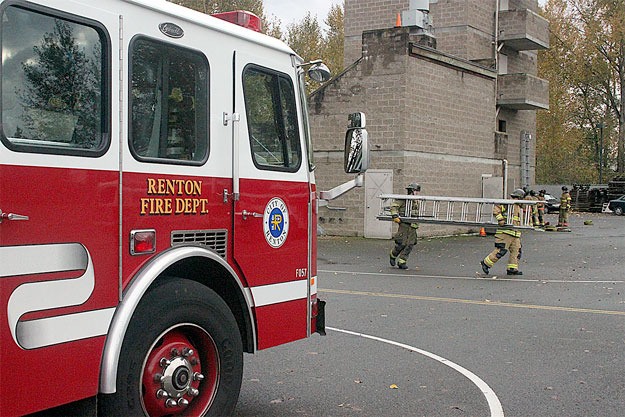 New firefighters from Renton and Auburn train Tuesday at Renton’s Fire Station No. 14 training center. Like Auburn