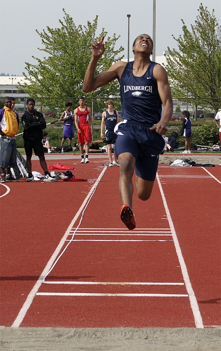 Lindbergh's David Bowman leaps on a long jump attempt at the Seamount League meet May 12.