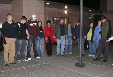 Celebration Church members gathered outside City Hall Monday to pray for the city and against adult entertainment in Renton.