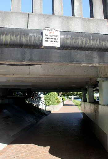 New signs have been added along the Lower Cedar River Trail encouraging walkers to report 'unwanted' behavior to the police.