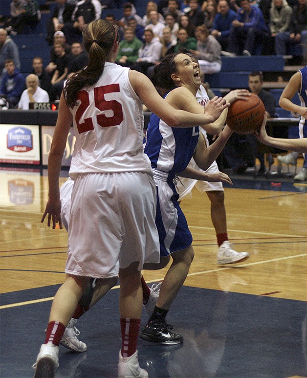 Liberty's Madison Birdsall goes up for a shot against Juanita Feb. 8.