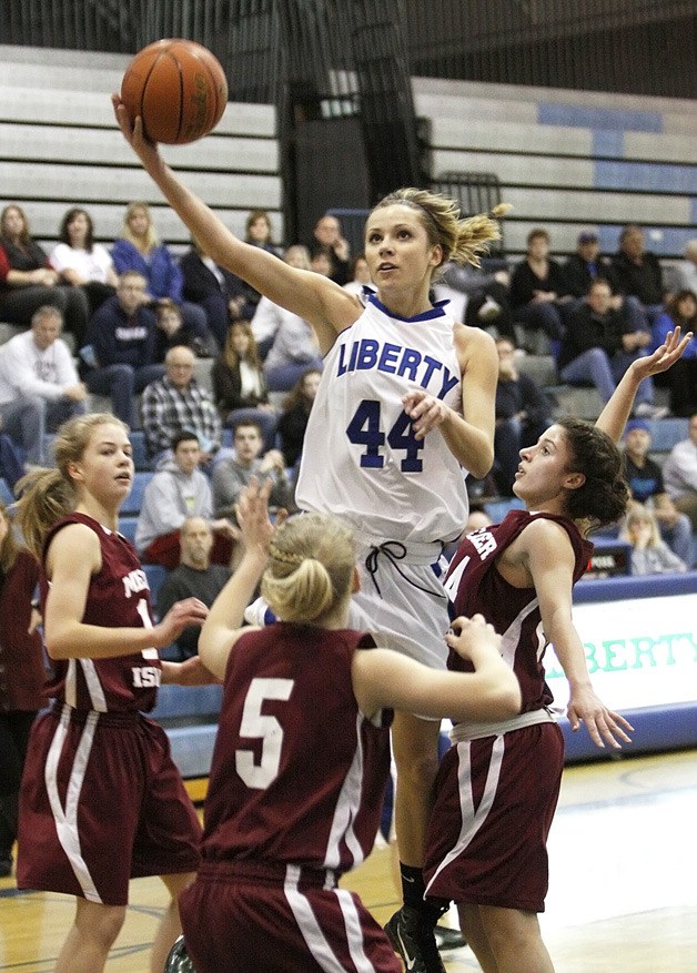 Liberty's Halie Ericksen goes up for a shot against Mercer Island Jan. 26.