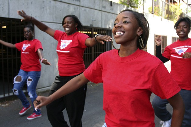 Members of the Super Steppers rehearse their drills before the Renton River Days parade. The Renton drill team is one of several entrants into this year's parade Saturday. From the left are Monique Duncan