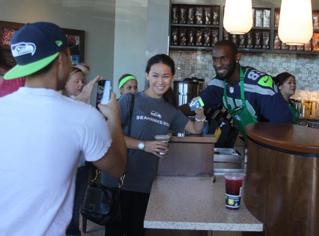 Seahawks wide receiver Ricardo Lockette poses for a photo during his time Tuesday as a 'guest barista' at a Starbucks in Kennydale.