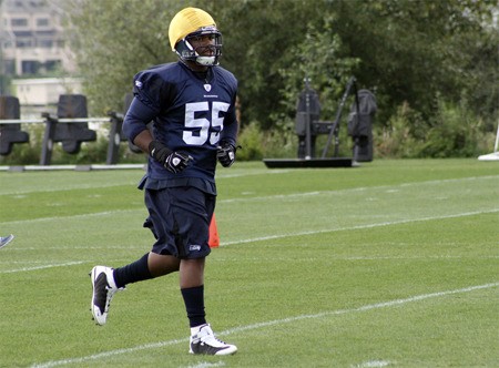 Darryl Tapp running through a drill at training camp last year.