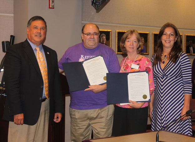 Mayor Denis Law on Monday proclaimed October Domestic Violence Awareness Month.