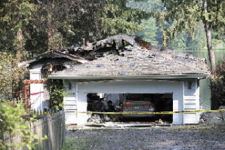 A fire ruled accidental destroyed the home of Darcy Burner in the Carnation area on Tuesday. She is running to unseat U.S. Rep. Dave Reichert in the Eighth Congressional District