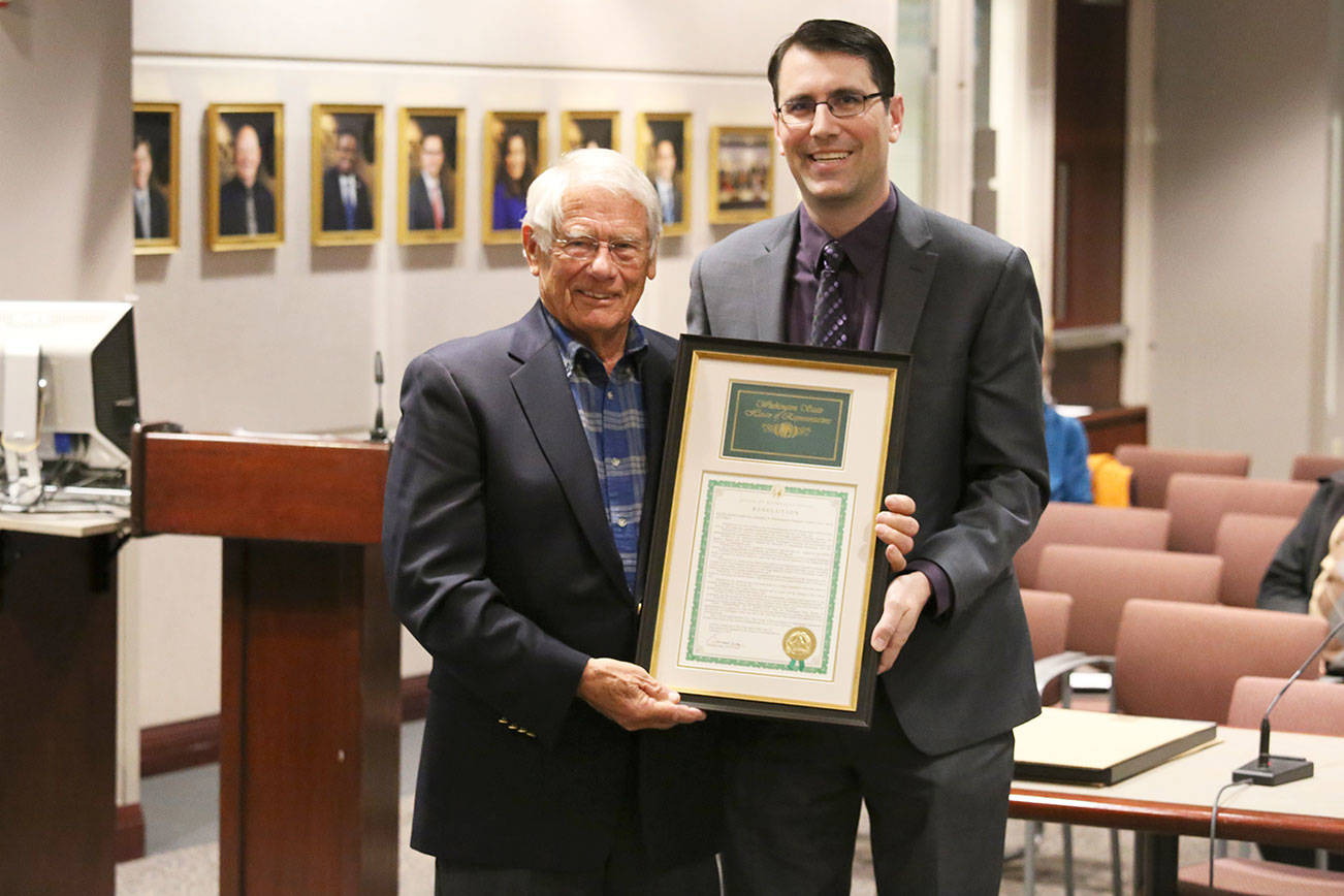 Rep. Steve Bergquist, right, shared a house resolution at the April 2 City Council meeting that honored former Renton School District Superintendent Gary Kohlwes, left. Photo courtesy of city of Renton