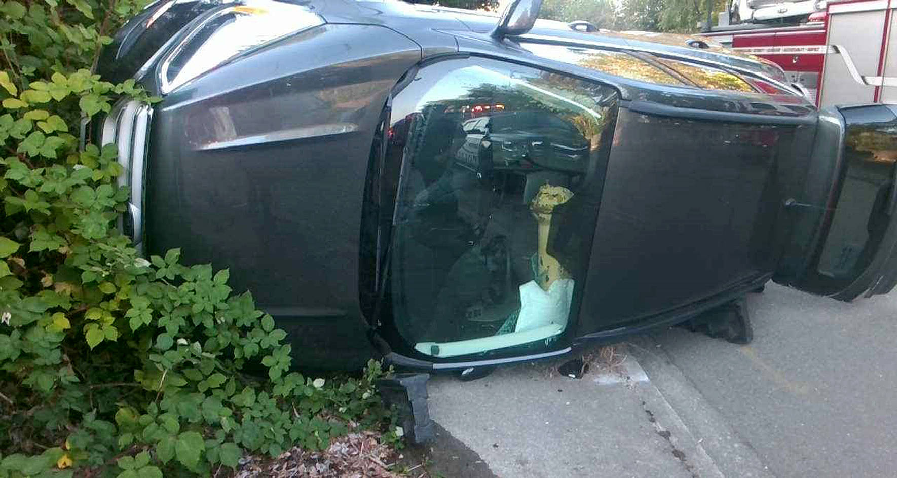 Photo courtesy Renton Police Department. A car rollover on Mill Avenue South led to a frightening sight— a fire hydrant went right through the driver’s side window. Despite the poor luck of landing on the hydrant, the driver did not sustain serious injuries.