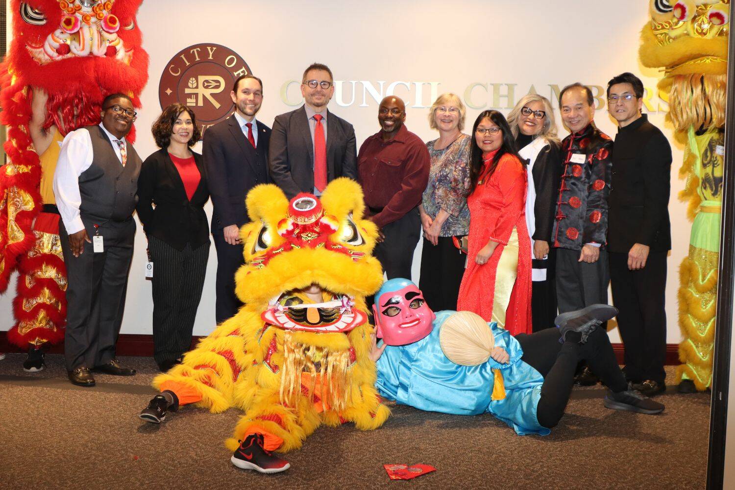 Renton City Council members pose with Lunar New Year dragons. (Courtesy of City of Renton)