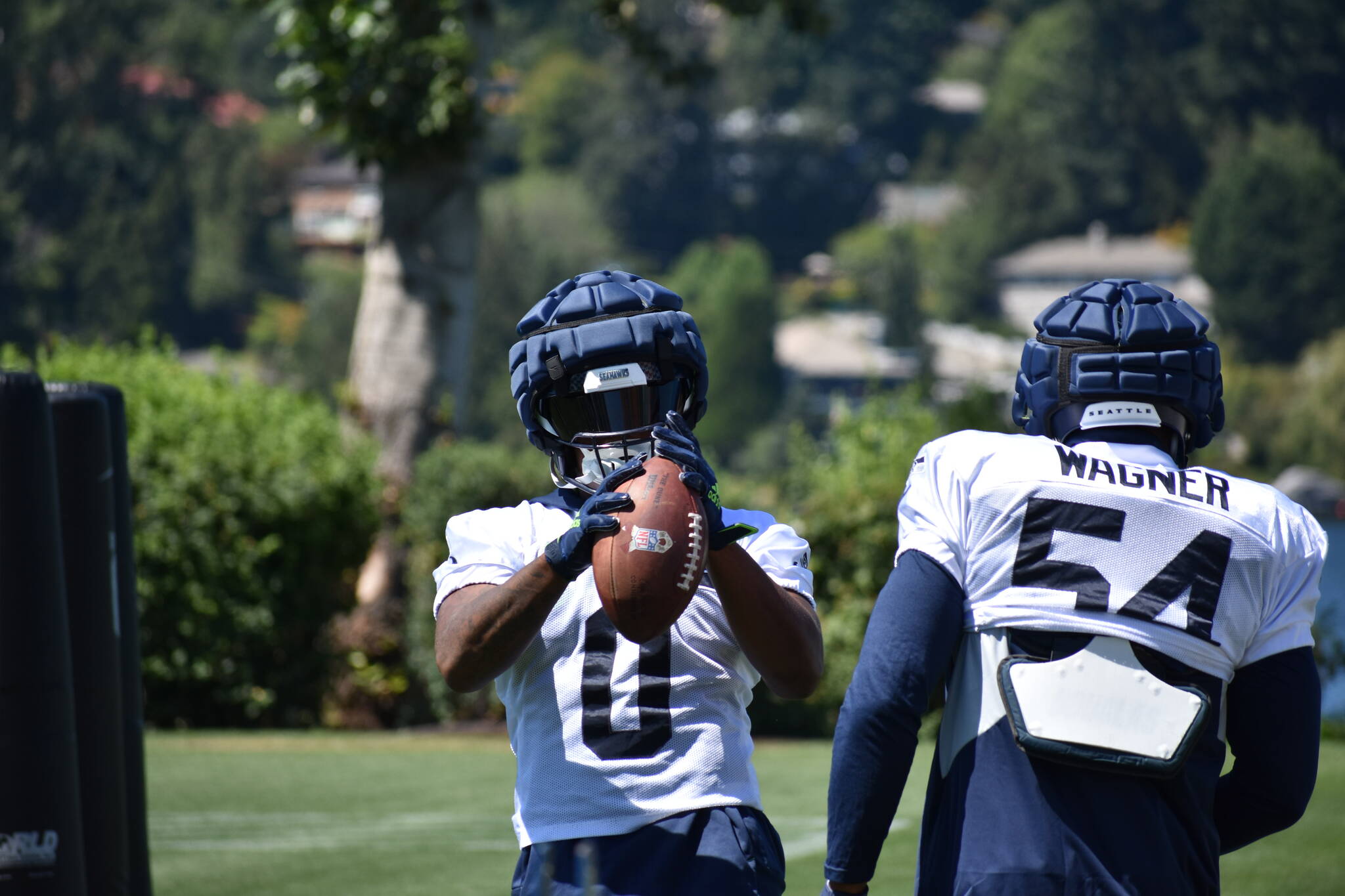 Seattle Seahawks wide receiver Tyler Lockett (16) smiles while running the  football Monday, May 22, 2023, at the team's NFL football training facility  in Renton, Wash. (AP Photo/Lindsey Wasson Stock Photo - Alamy