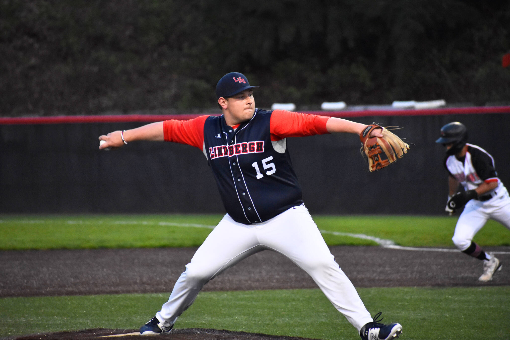 Kyle Burris takes to the mound against Sammamish at Bannerwood Park. Ben Ray / The Reporter