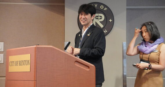 Mayor Shozo Katayama of Nishiwaki, Japan, with his translator at the July 8 Renton City Council meeting. Photo by Joshua Solorzano/The Reporter