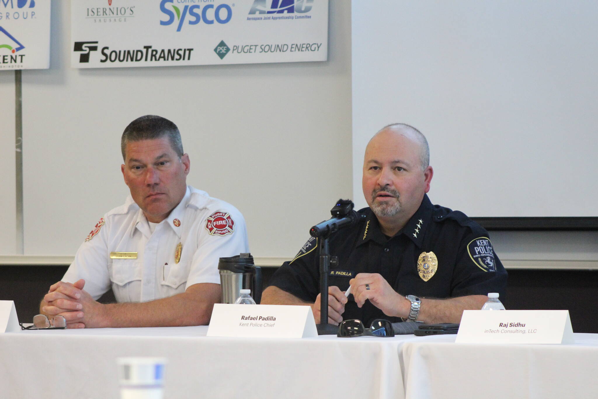 Photo by Bailey Jo Josie/Sound Publishing
Puget Sound Fire Chief Brian Carson and Kent Police Chief Rafael Padilla discuss safety and security for Kent businesses.