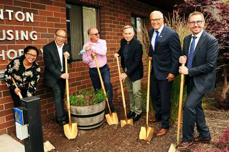 Renton Mayor Armondo Pavone, Governor Jay Inslee, and King County Executive Dow Constantine, as they celebrate the groundbreaking of the Sunset Gardens housing project. Courtesy of the City of Renton