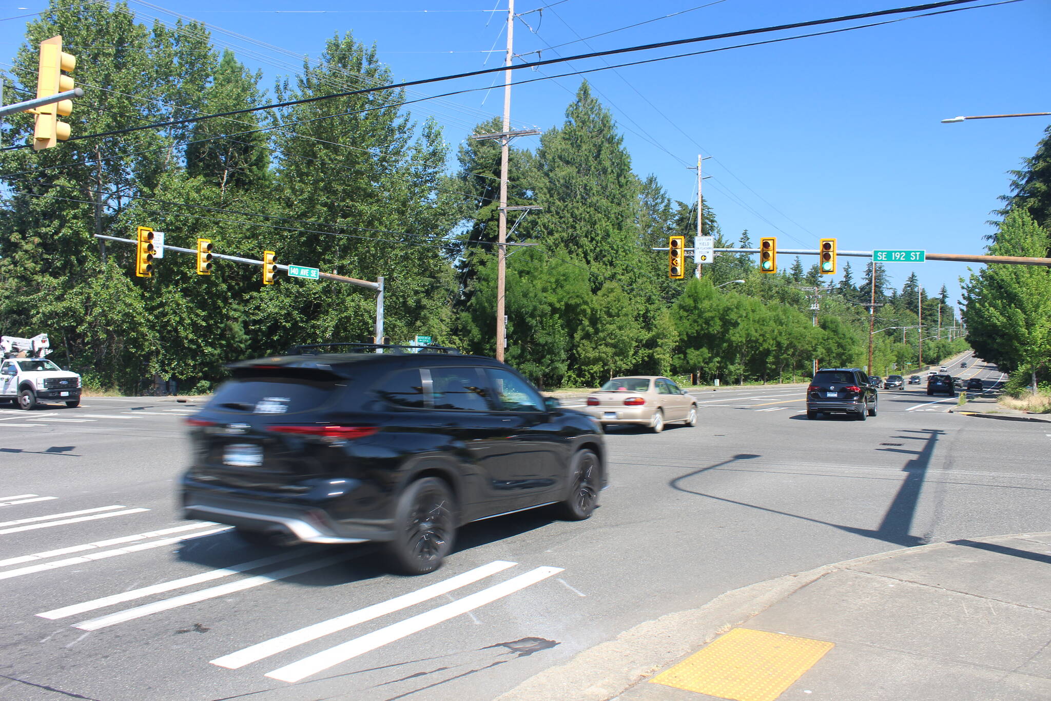 Cars drive northbound through the intersection of Southeast 192nd Street and 140th Avenue Southeast in Fairwood. An 18-year-old was driving over 100 mph southbound through this intersection on March 19 when his car hit a minivan, resulting in the deaths of one woman and three minors. Photo by Bailey Jo Josie/Sound Publishing