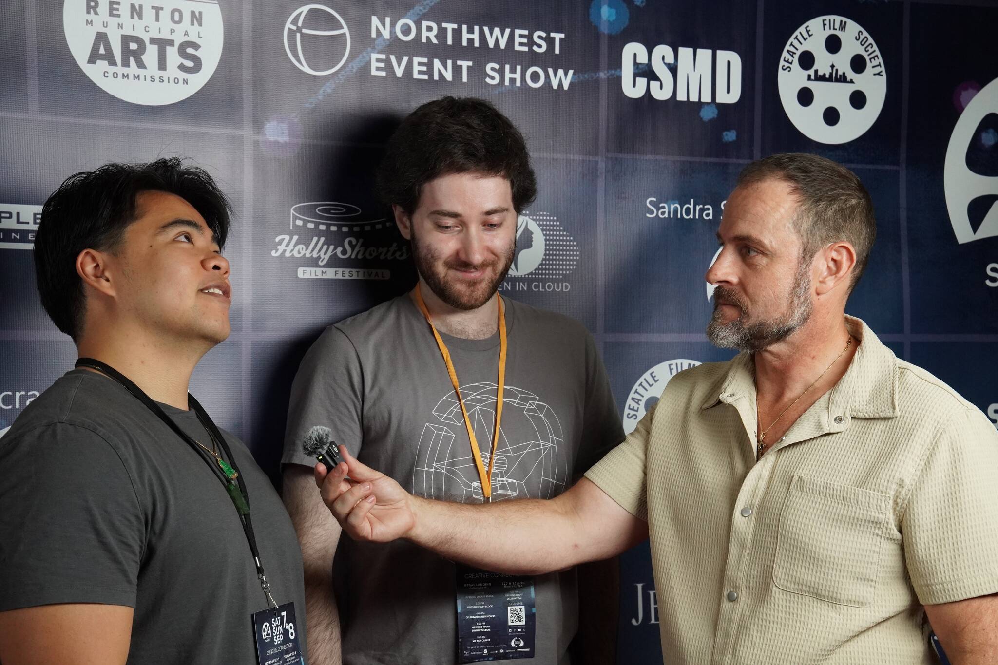 Ben Andrews interviewing Sean Nguyen, while Tommy Heffernan waits for his next question. Photo by Joshua Solorzano/The Reporter