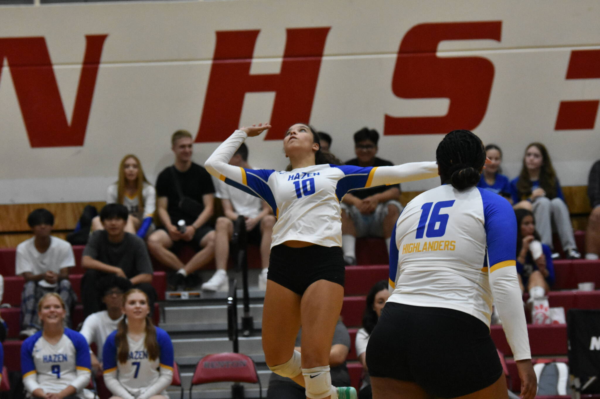 Arisa May-Kelly for Hazen leaps for a spike attempt. Ben Ray / The Reporter