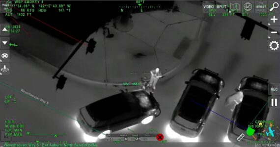 The suspect being arrested caught by the WSP surveillance aircraft. Screenshot from WSP Youtube.