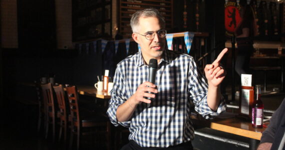 Vision House Executive Director Derek Sciba talks about the work Vision House does to help unhoused families in Renton and King County. Sciba was the guest speaker at the first Renton Reporter Read-All-About-It on Monday, Sept. 23. Hosted at Berliner Pub in downtown Renton, the event allowed local readers to meet and chat with Renton Reporter staff while enjoying some food and drink. Photo by Bailey Jo Josie/Sound Publishing