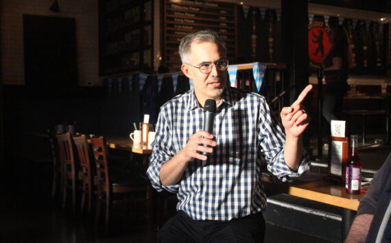 Vision House Executive Director Derek Sciba talks about the work Vision House does to help unhoused families in Renton and King County. Sciba was the guest speaker at the first Renton Reporter Read-All-About-It on Monday, Sept. 23. Hosted at Berliner Pub in downtown Renton, the event allowed local readers to meet and chat with Renton Reporter staff while enjoying some food and drink. Photo by Bailey Jo Josie/Sound Publishing