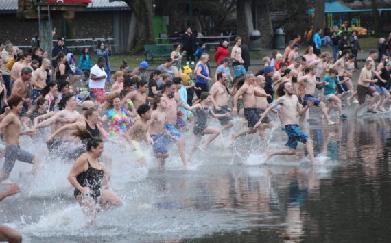 On your mark, get set, plunge! Swimmers jump into the cold water at Renton’s Gene Coulon Park on Jan. 1. Bailey Jo Josie/Sound Publishing.