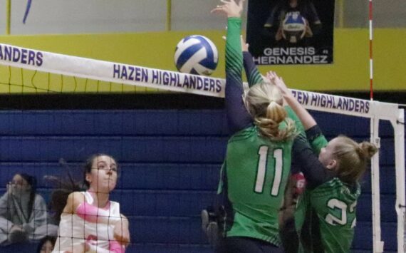 After a blazing spike from Jaesi Hayes, Woodinville volleyball blocks the ball back into the Hazen side. Photo provided by Tyler Rubenstein