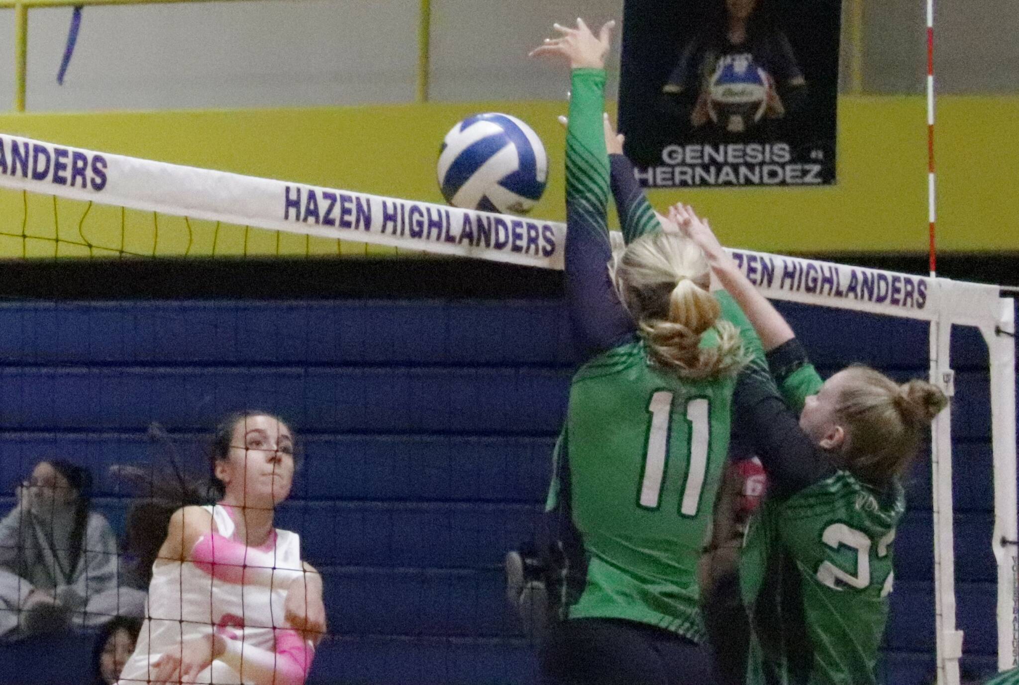 After a blazing spike from Jaesi Hayes, Woodinville volleyball blocks the ball back into the Hazen side. Photo provided by Tyler Rubenstein