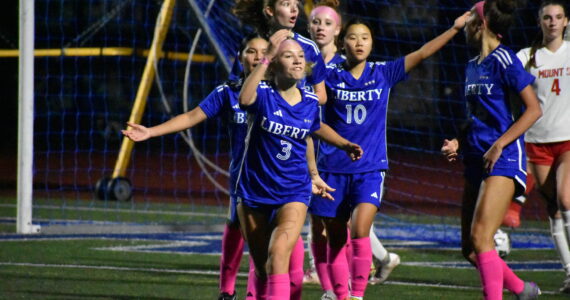 Adeline Struer leads the charge of disapproval of a referee decision to disallow a goal. Ben Ray / The Reporter