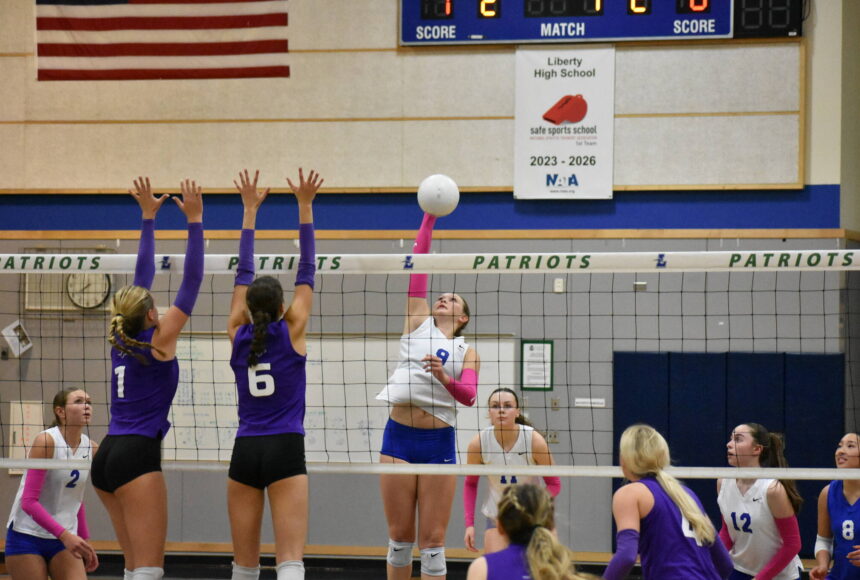 <p>Liberty senior with a kill for the Patriots against Lake Washington. Ben Ray / The Reporter</p>