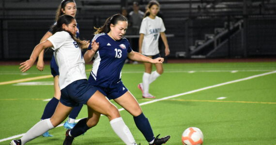 Vivan Tran goes for the ball in a challenge against Interlake for Lindbergh. Ben Ray / The Reporter