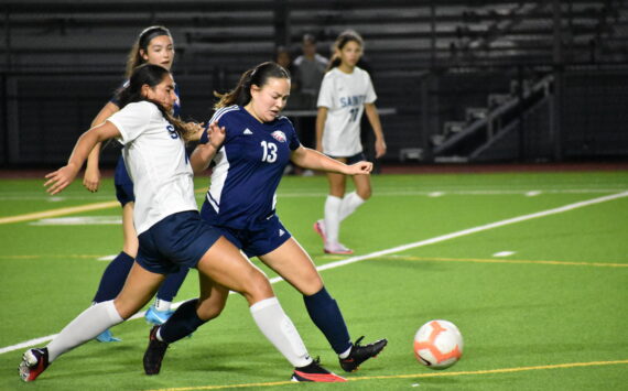 Vivan Tran goes for the ball in a challenge against Interlake for Lindbergh. Ben Ray / The Reporter