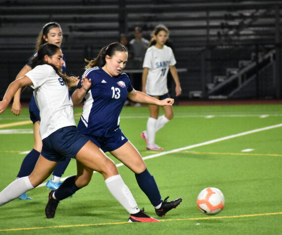 Vivan Tran goes for the ball in a challenge against Interlake for Lindbergh. Ben Ray / The Reporter