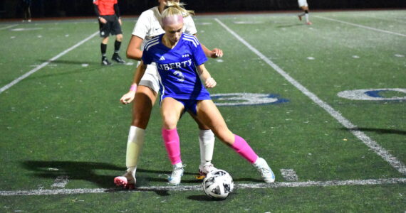 Addie Streur with control of the ball against Bellevue. Ben Ray / The Reporter