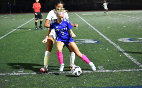 Addie Streur with control of the ball against Bellevue. Ben Ray / The Reporter