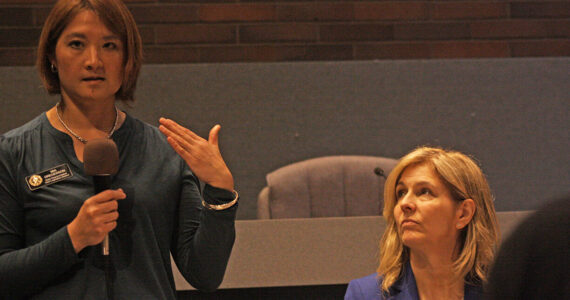 In this file photo, State Rep. Mia Gregerson answers a question as Rep. Tina Orwell listens during a town hall meeting. Both won re-election in the Nov. 2024 general election. (File photo)