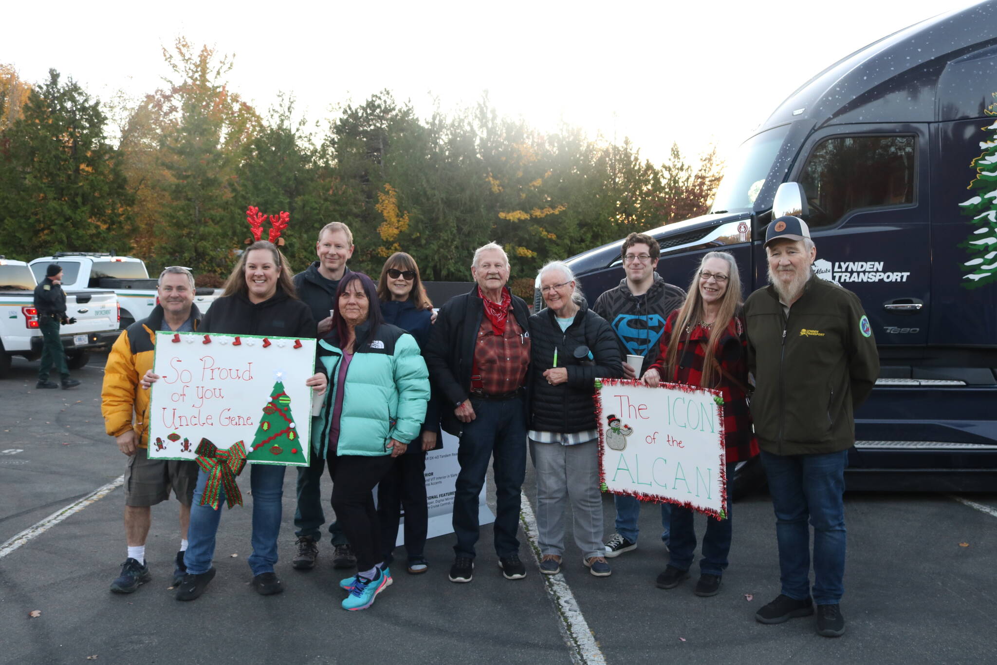 The Austin family arrived from all over Western Washington to greet Gene Austin, 89, (center) and John Schank (far right), the two drivers hauling the Christmas tree to Washington, D.C. Photo by Bailey Jo Josie/Sound Publishing.