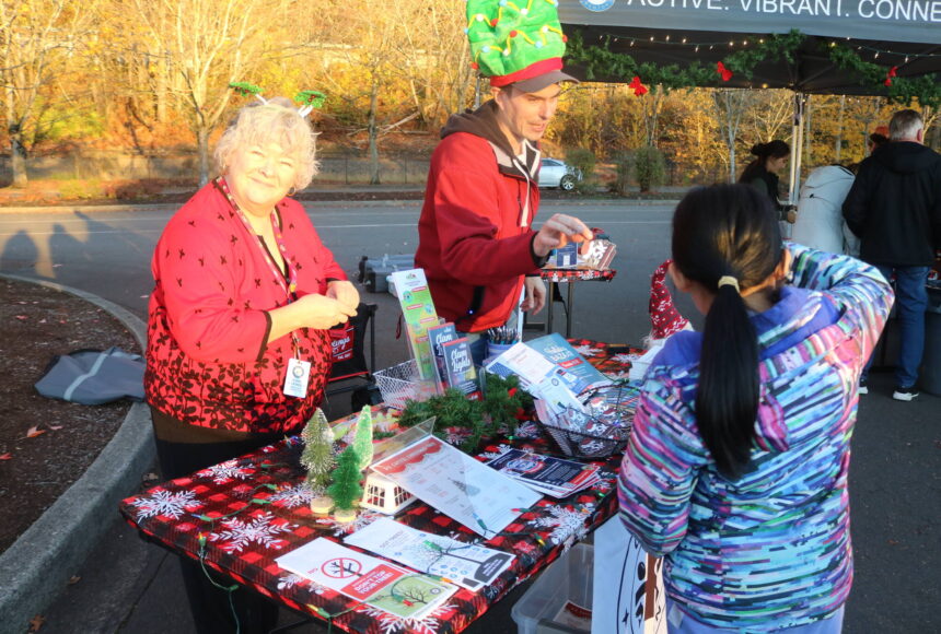 <p>On Nov. 6, the city of Renton was the only Washington state stop on the 2024 U.S. Capitol Christmas Tree tour as an enormous Sitka spruce rolled into town, expertly parking at the Gene Coulon Boat Launch. Folks could also enjoy informational booths from the National Forest Service, Kenworth, Renton’s Parks and Recreation Department and various food trucks. (Photo by Bailey Jo Josie/Sound Publishing)</p>