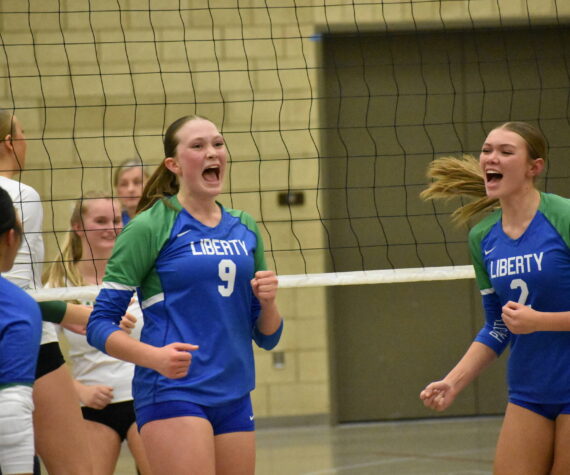 Maiya Lester and Hayden Quinto celebrate a point against Bishop Blanchet. Ben Ray / The Reporter