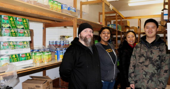 Jay West, Haley Boltz, Laura Kinzel and Kyle Wong are volunteers at Margie Williams Helping Hands Food Center, located at 4519 NE 10th Street in the Renton Highlands. Photo by Bailey Jo Josie/Sound Publishing