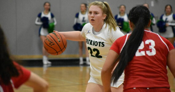 Ella Whitaker sizes up her opponent while running the Liberty offense. Ben Ray / The Reporter