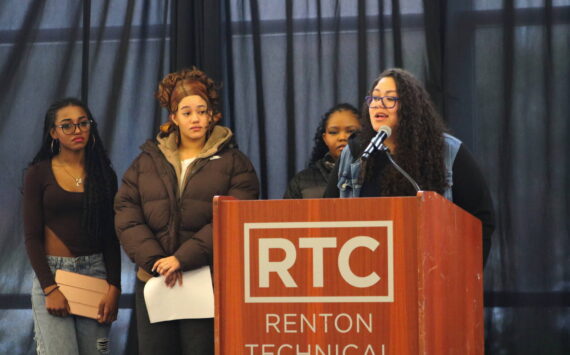 Kirsten Thornton (right) speaks at the Black History Month forum about the Renton School District’s upcoming HBCU Delegation and Tour. Students who part of previous HBCU tours also spoke about their experiences. Photo by Bailey Jo Josie/Sound Publishing.