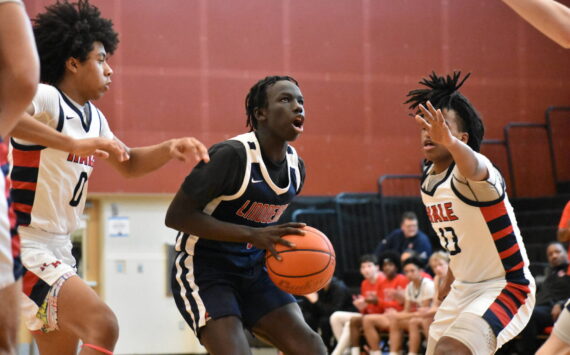 Lindbergh senior John Choul is surrounded by Nathan Hale defenders. Ben Ray / The Reporter